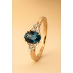 14KT.RING 0,16 W.SI+ LB TOPAS OVAL 