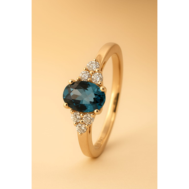 14KT.RING 0,16 W.SI+ LB TOPAS OVAL 